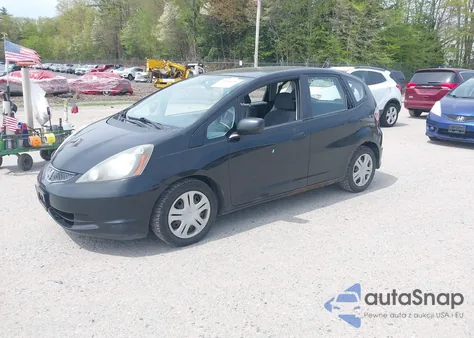 2009 Honda Fit from USA, damaged, VIN JHMGE872X9S061071